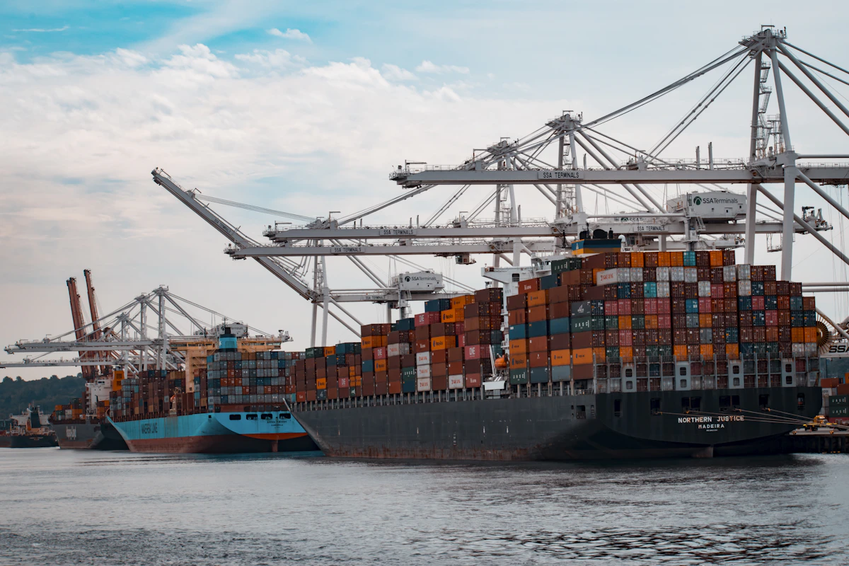 Container ship loaded with export cargo at seaport — Bhatti Chemicals Industry